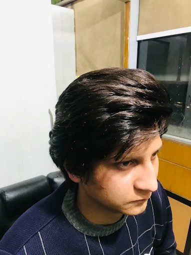 Hair styling after replacement at Indira Hair Weaving Centre